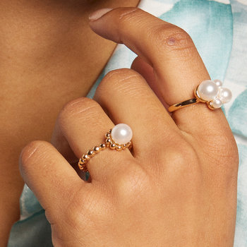 set di anelli intrecciati con perla